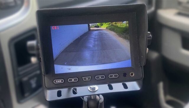 material monitoring camera for rearview visibility