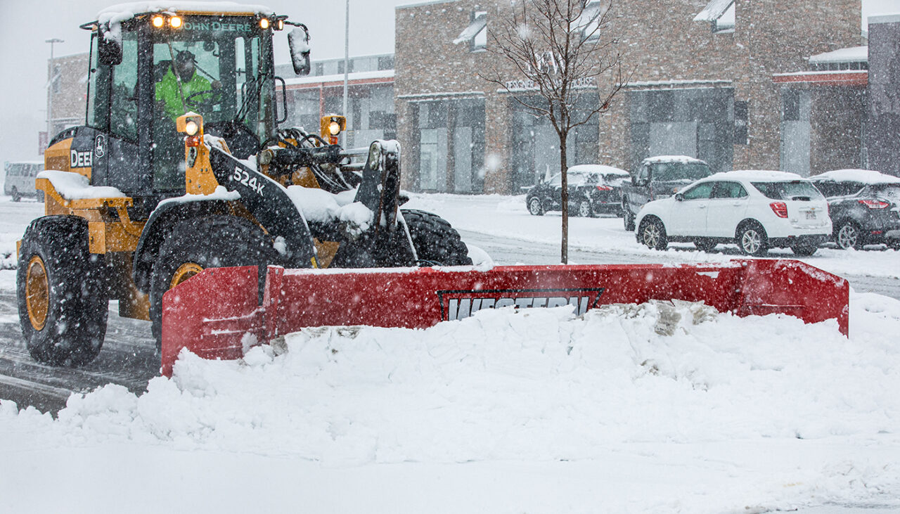 pile driver xl on wheel loader plowing