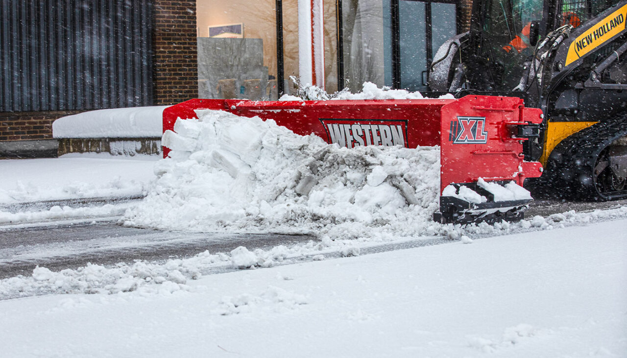 PILED RIVER XL Skid-Steer Plowing