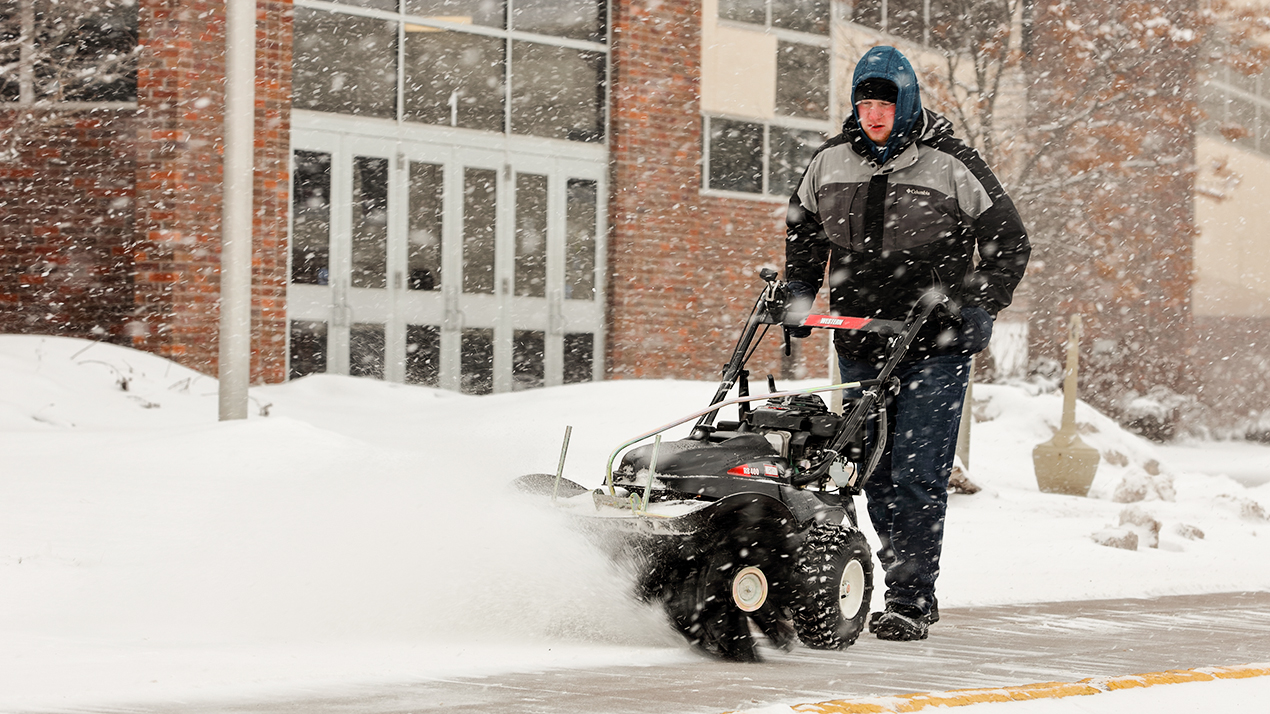 Rotary Broom in action on sidewalk