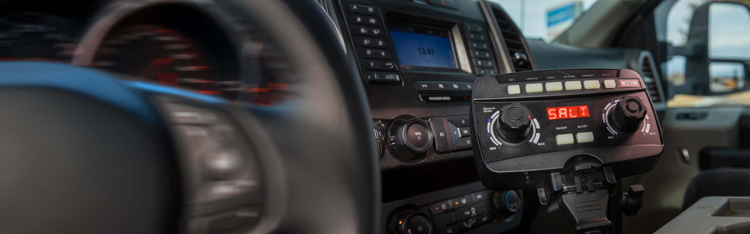 auto speed control for hopper spreaders