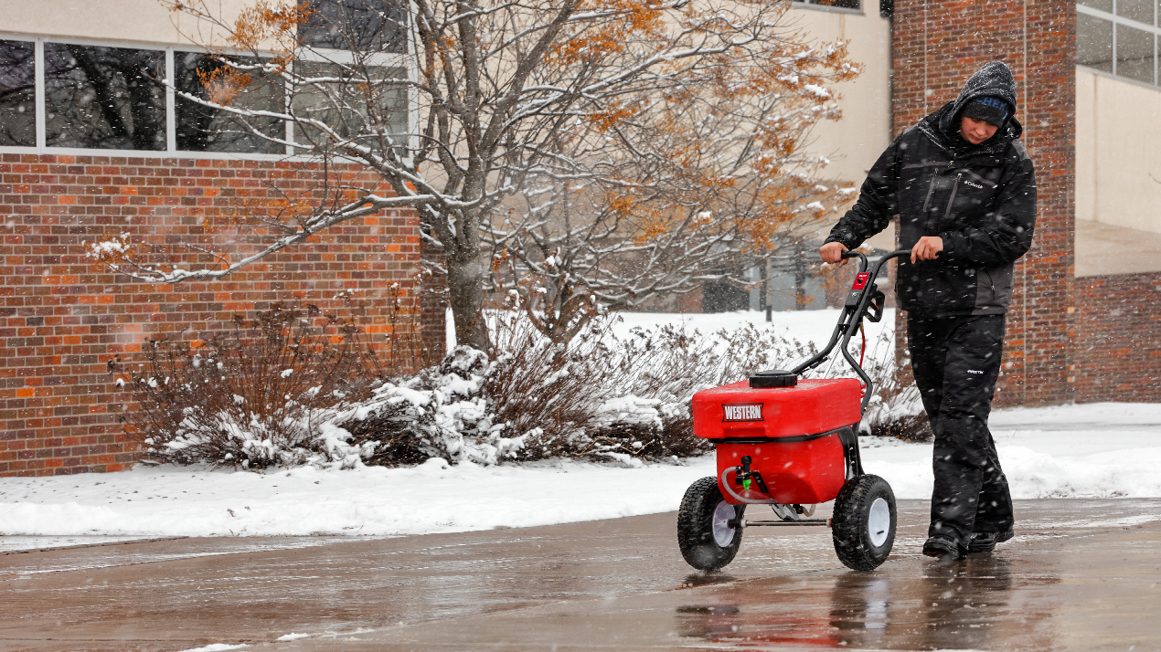 Walk behind sidewalk sprayer